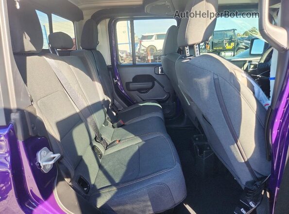 1C6RJTAG9TL156890 2026 JEEP GLADIATOR Purple Vista de los asientos traseros