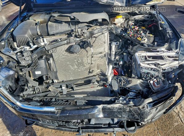 1C6SRFHP3SN596107 2025 RAM 1500 Черный Вид задней части салона
