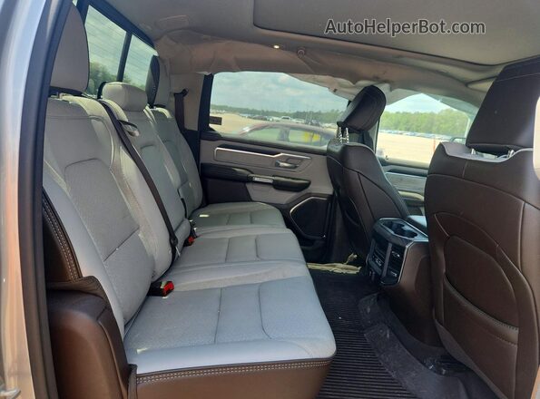 1C6SRFJP0SN525912 2025 RAM 1500 Silver Rear seats view