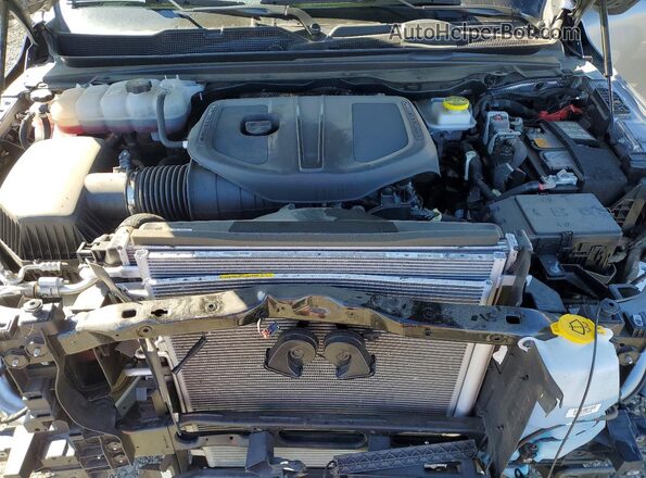 1C6SRFLPXSN546862 2025 RAM 1500 Silver Вид задньої частини салону