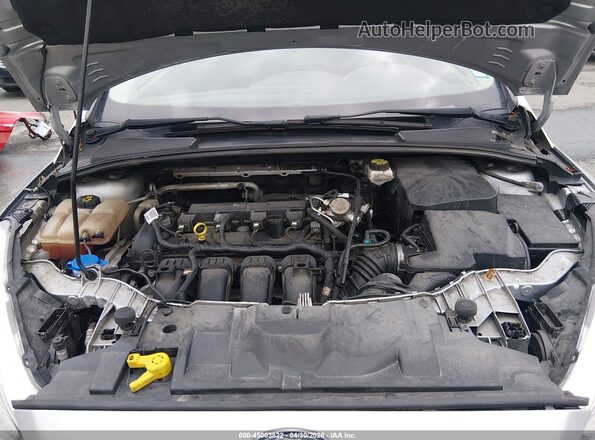 1FADP3E21JL310169 2018 FORD FOCUS Серебряный Вид сзади