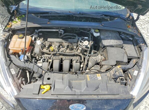 1FADP3E24JL307685 2018 FORD FOCUS Черный Вид задней части салона