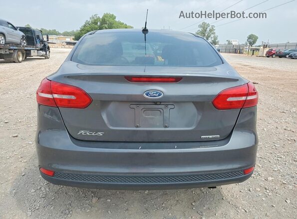 1FADP3E28GL281682 2016 FORD FOCUS Серый Вид сзади