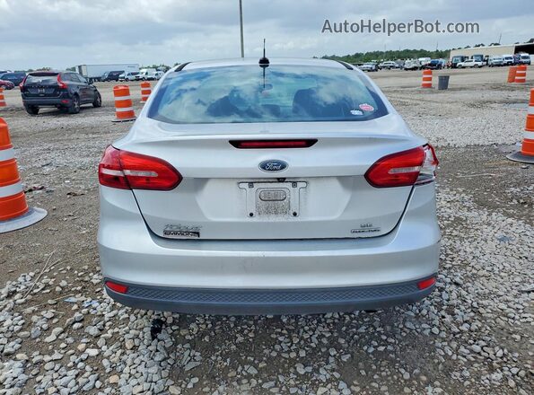 1FADP3F20GL348998 2016 FORD FOCUS Silver Vista trasera