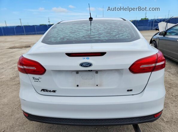1FADP3F20HL275049 2017 FORD FOCUS Белый Вид сзади