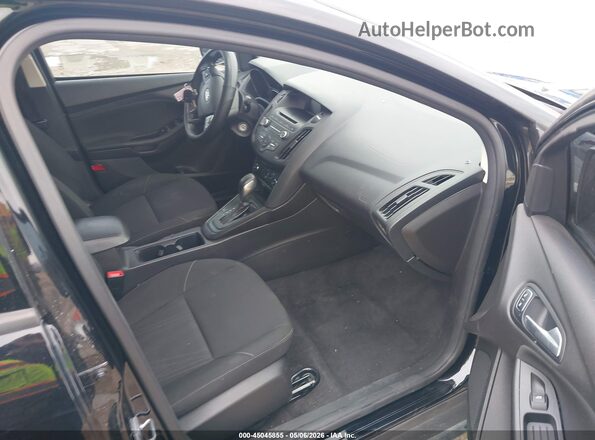 1FADP3F20HL338070 2017 FORD FOCUS Черный Вид салона спереди
