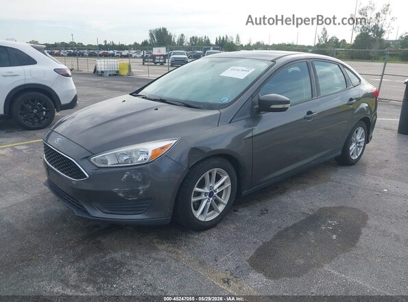 1FADP3F21GL235240 2016 FORD FOCUS Серый Вид спереди