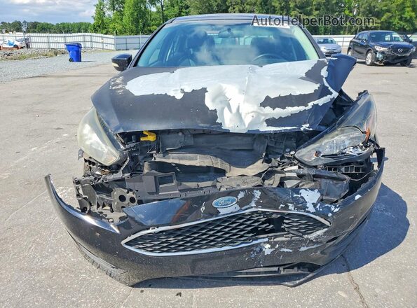 1FADP3F21GL307487 2016 FORD FOCUS Black Front view