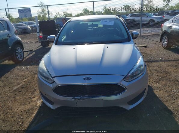 1FADP3F21GL377944 2016 FORD FOCUS Серебряный Вид задней части салона