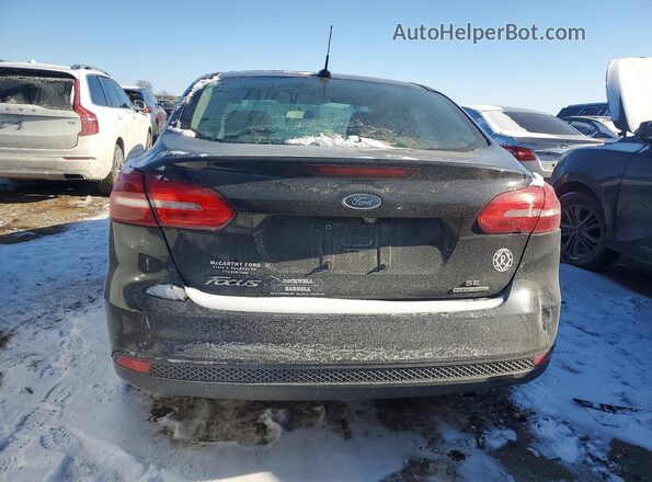1FADP3F21GL393979 2016 FORD FOCUS Черный Вид сзади