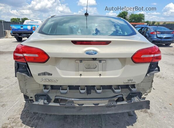 1FADP3F22GL318336 2016 FORD FOCUS Бежевый Вид сзади