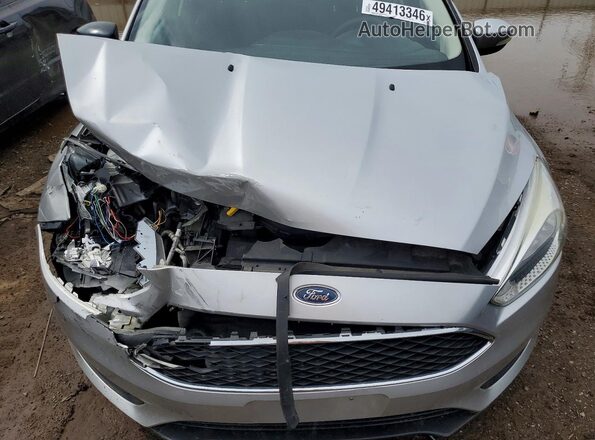 1FADP3F22HL221736 2017 FORD FOCUS Серебряный Вид задней части салона