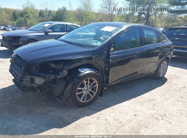 1FADP3F24GL348485 2016 FORD FOCUS Черный Передняя левая четверть