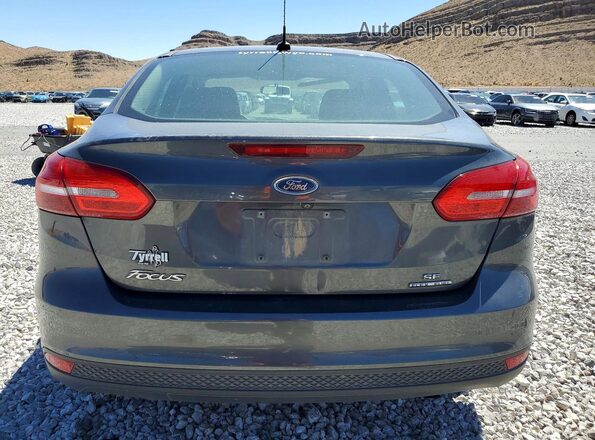 1FADP3F24GL372561 2016 FORD FOCUS Серый Вид сзади