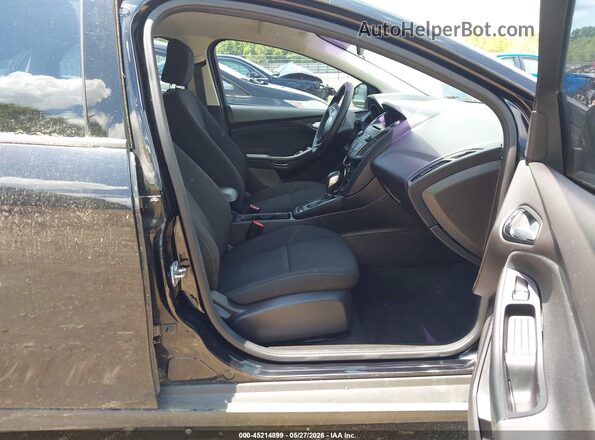 1FADP3F25HL253497 2017 FORD FOCUS Черный Вид салона спереди