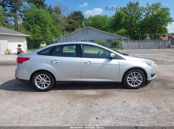 1FADP3F25JL235183 2018 FORD FOCUS Серебряный Вид задней части салона