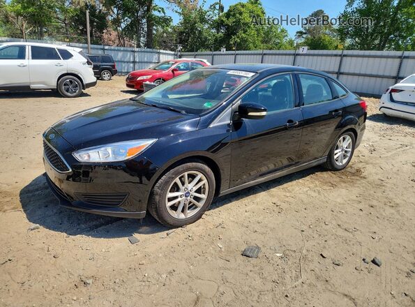 1FADP3F26GL218787 2016 FORD FOCUS Черный Передняя левая четверть