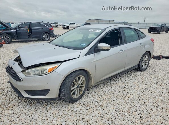 1FADP3F29GL360695 2016 FORD FOCUS Silver Vista tres cuartos delantera izquierda