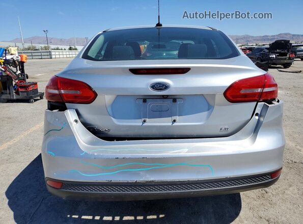 1FADP3F29HL215738 2017 FORD FOCUS Серебряный Вид сзади