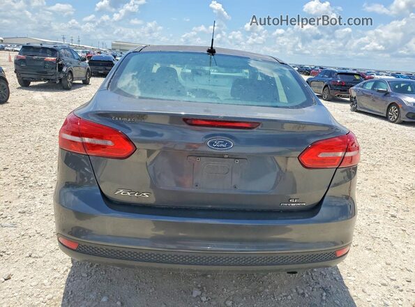 1FADP3F2XGL359331 2016 FORD FOCUS Gray Vista trasera