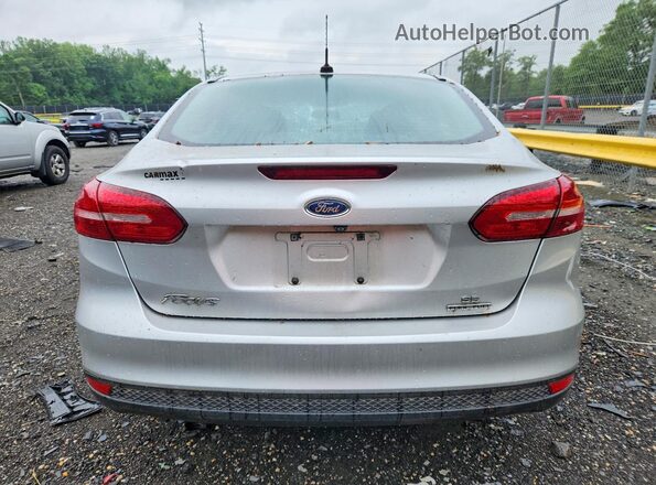 1FADP3F2XGL389431 2016 FORD FOCUS Серебряный Вид сзади