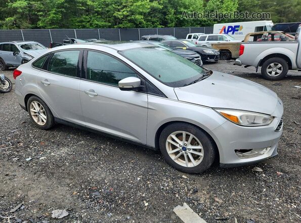 1FADP3F2XGL389431 2016 FORD FOCUS Серебряный Передняя правая четверть