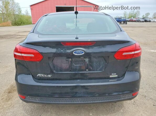 1FADP3FE0JL262804 2018 FORD FOCUS Черный Вид сзади
