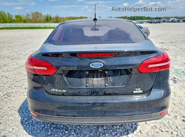 1FADP3FE4JL321871 2018 FORD FOCUS Черный Вид сзади