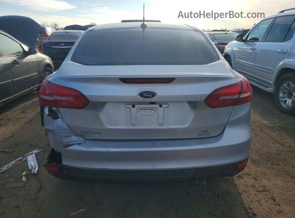 1FADP3FE6HL308128 2017 FORD FOCUS Серебряный Вид сзади