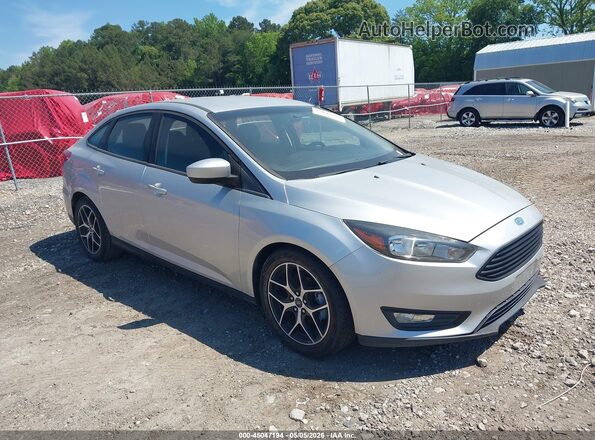 1FADP3FE6JL243173 2018 FORD FOCUS Серебряный Передняя правая четверть