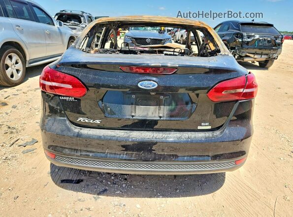 1FADP3FE8JL201264 2018 FORD FOCUS Burn Vista trasera
