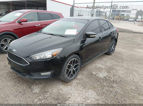 1FADP3H23JL312775 2018 FORD FOCUS Черный Передняя левая четверть