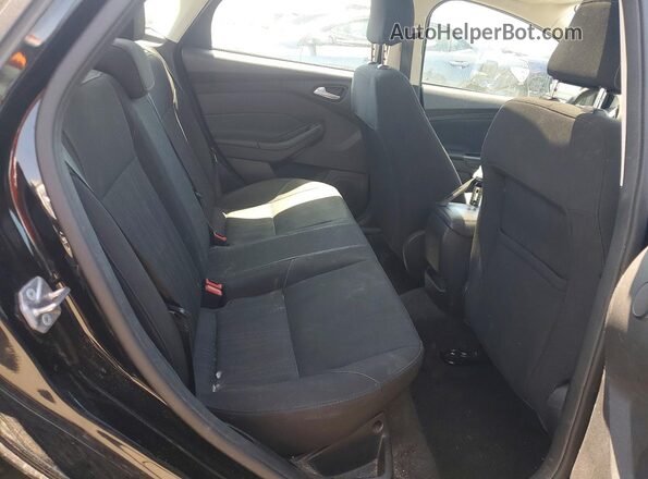 1FADP3H24JL221370 2018 FORD FOCUS Black Vista de los asientos traseros