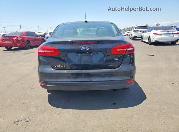 1FADP3H24JL221370 2018 FORD FOCUS Black Vista trasera