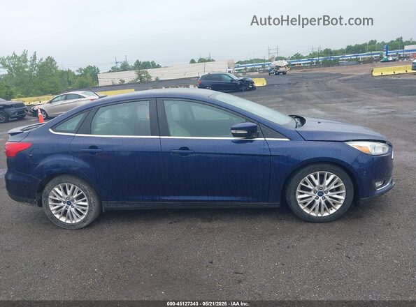1FADP3J20HL202559 2017 FORD FOCUS Синий Вид задней части салона