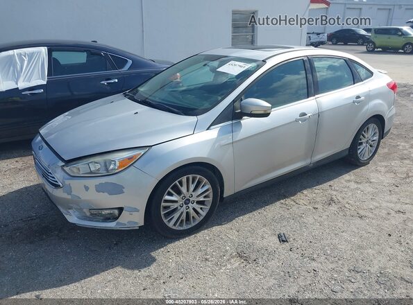 1FADP3J20HL291548 2017 FORD FOCUS Серебряный Передняя левая четверть
