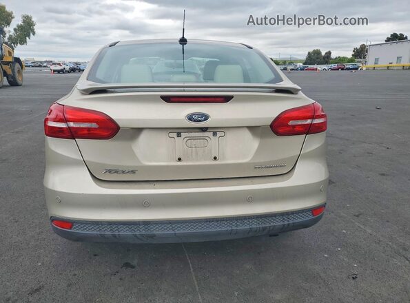 1FADP3J26HL287830 2017 FORD FOCUS Желто-коричневый Вид сзади