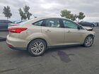 2017 Ford Focus Titanium Желто-коричневый vin: 1FADP3J26HL287830
