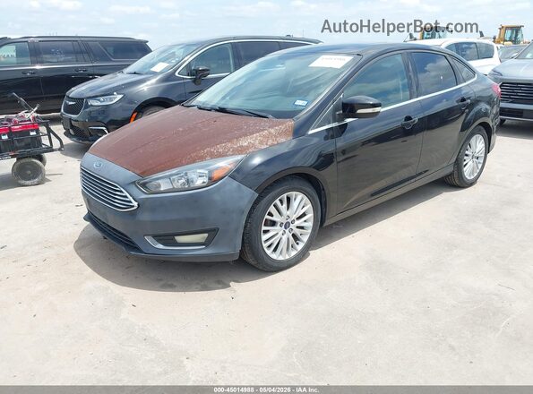 1FADP3J28GL237168 2016 FORD FOCUS Black Vista tres cuartos delantera izquierda