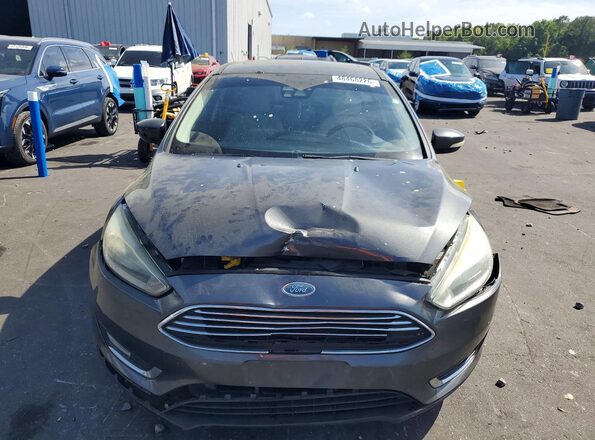 1FADP3J29HL281696 2017 FORD FOCUS Серый Вид спереди