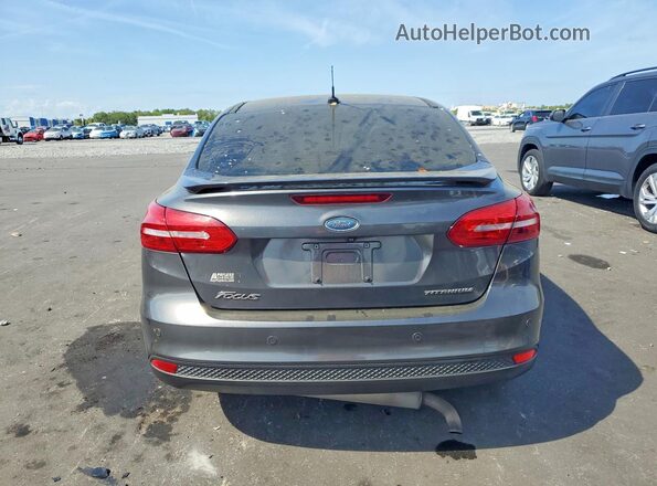 1FADP3J29HL281696 2017 FORD FOCUS Серый Вид сзади