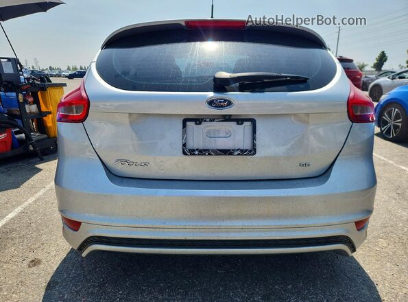 1FADP3K20GL372627 2016 FORD FOCUS Серебряный Вид сзади