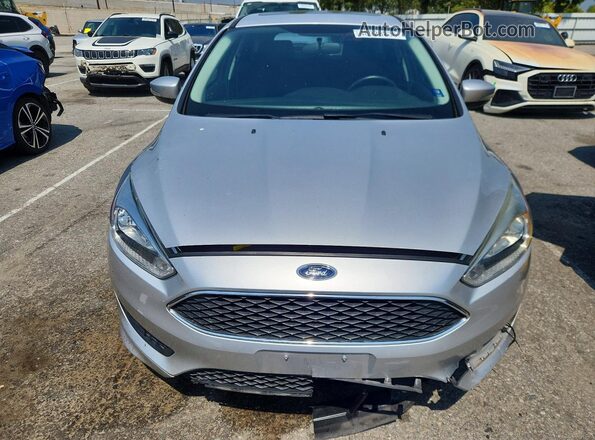 1FADP3K20GL372627 2016 FORD FOCUS Серебряный Вид спереди