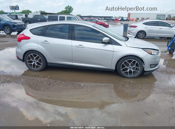 1FADP3M24JL244024 2018 FORD FOCUS Серебряный Вид задней части салона
