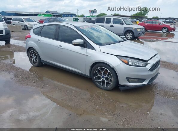 1FADP3M24JL244024 2018 FORD FOCUS Серебряный Передняя правая четверть