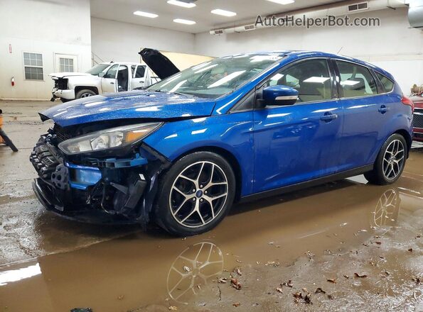 1FADP3M28JL323891 2018 FORD FOCUS Синий Передняя левая четверть
