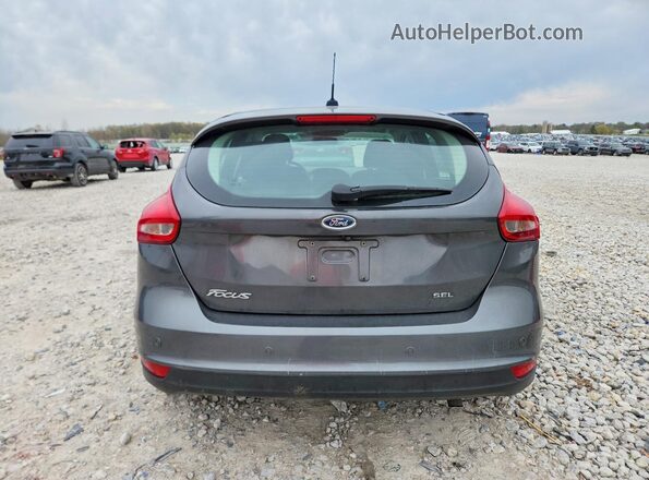 1FADP3M29HL324008 2017 FORD FOCUS Серый Вид сзади