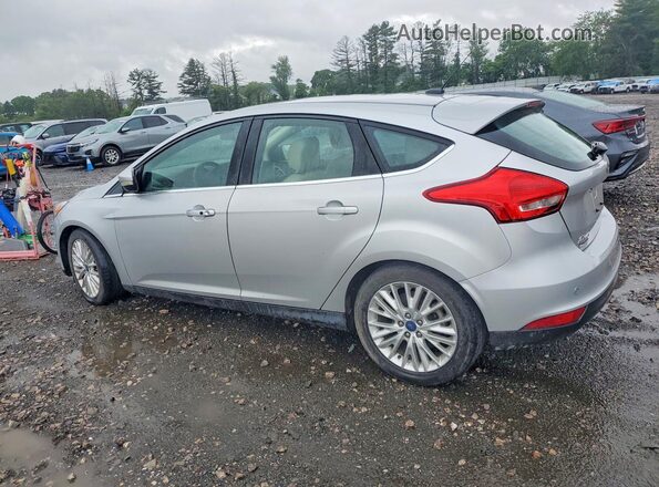 1FADP3N27JL271877 2018 FORD FOCUS Серебряный Задняя левая четверть