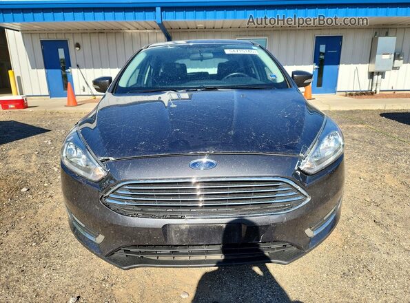 1FADP3N29GL344224 2016 FORD FOCUS Серый Вид спереди