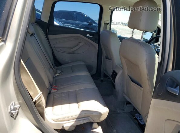 1FADP5CU1GL101975 2016 FORD C-MAX Tan Vista de los asientos traseros
